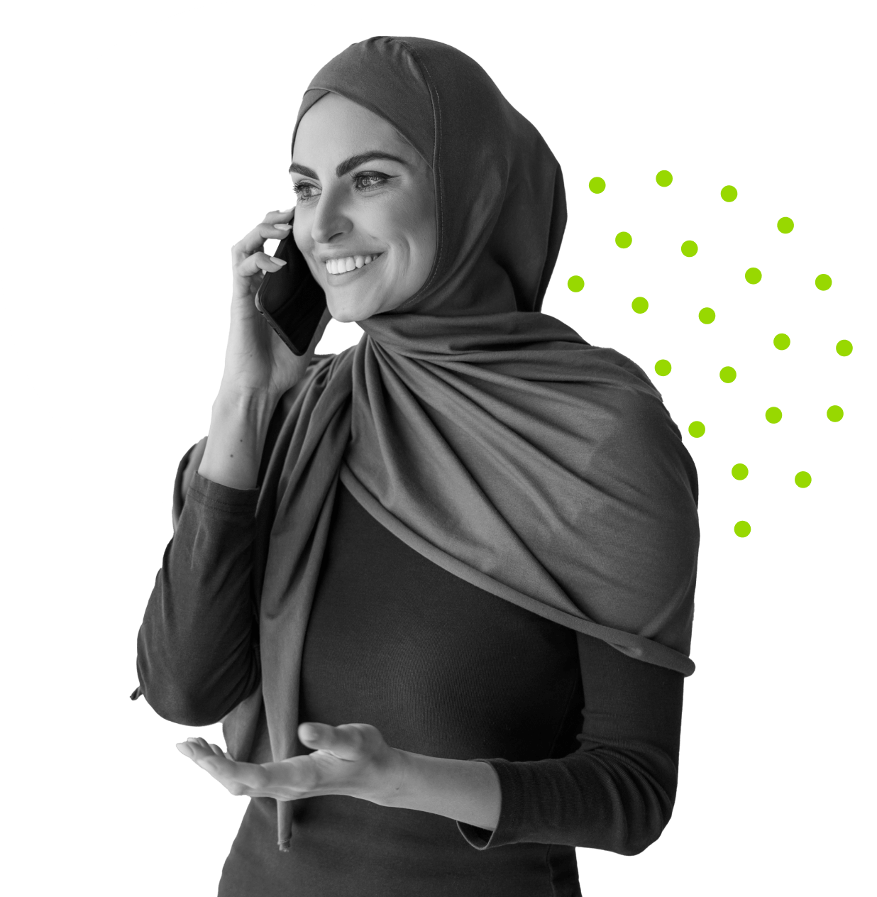 A smiling woman wearing a hijab talks on a smartphone. She gestures with her hand and stands in front of a white circle and green dotted background elements.